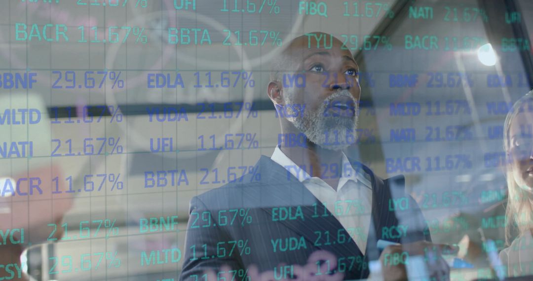 Businessman Analyzing Financial Data Hologram in Modern Office