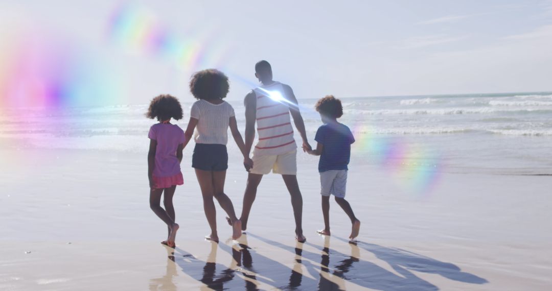 Joyful Family Walking on Beach with Vibrant Light Effects