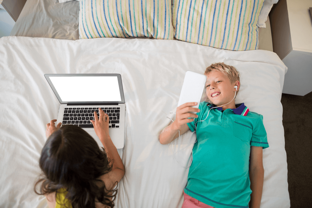 Transparent Technology Use Among Siblings Inside Cozy Bedroom Setting