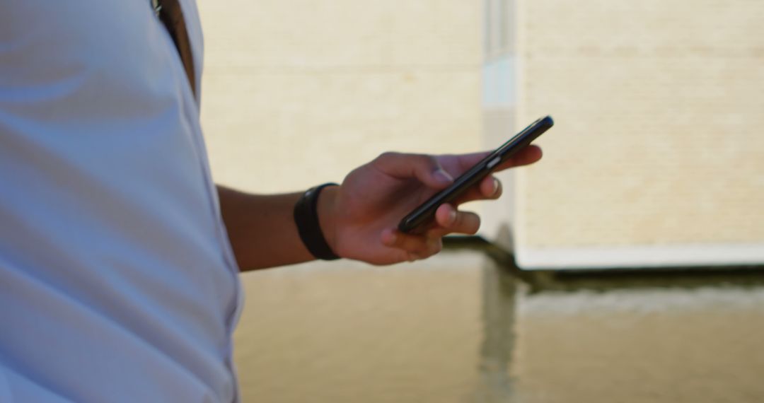 Close-up of Person Holding Smartphone Near Water - Free Images, Stock Photos and Pictures on Pikwizard.com