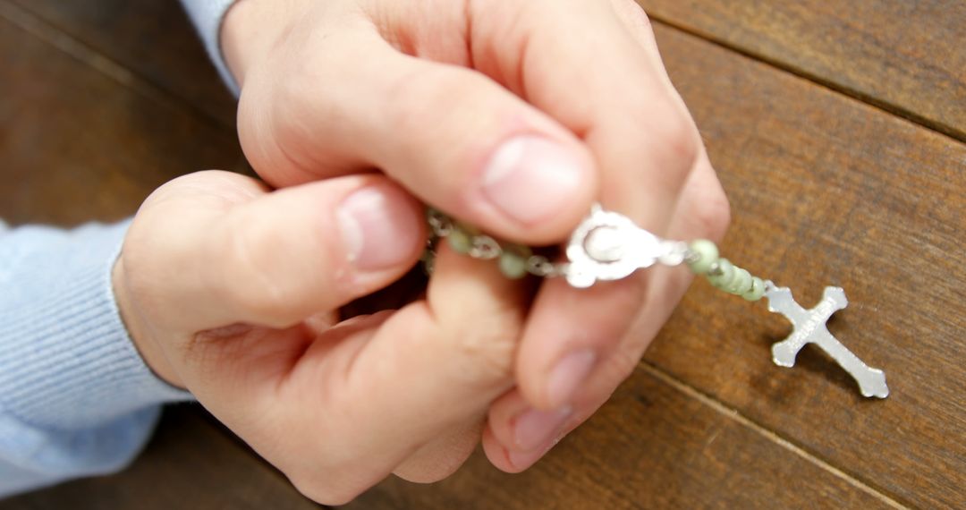 Hands Holding Rosary Beads in Prayer - Free Images, Stock Photos and Pictures on Pikwizard.com