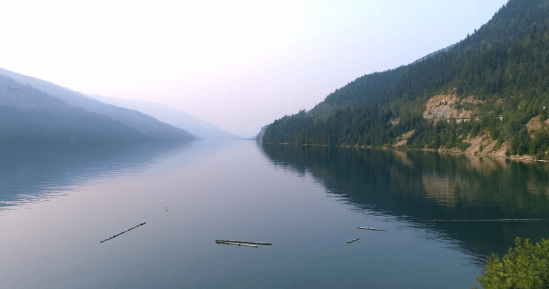 Serene Mountain River View in Transparent Misty Atmosphere