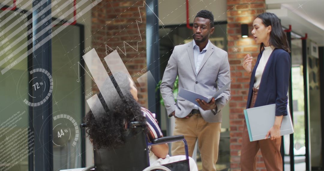 Diverse Business Team Discussing Data Charts in Office