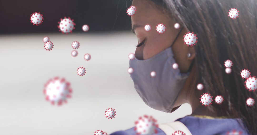 Woman Wearing Face Mask Amidst Floating Virus Particles