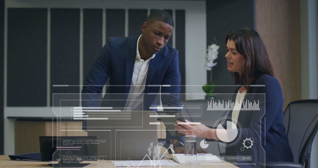 Business Professionals Analyzing Digital Interface and Data