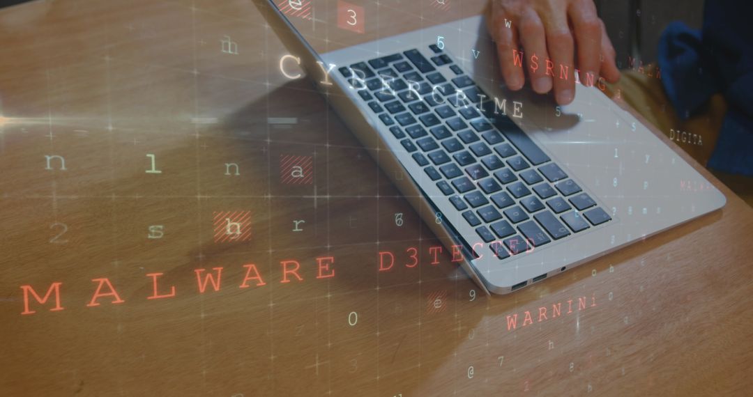 Cybersecurity Threat Concept with Visible Malware Warning on Laptop