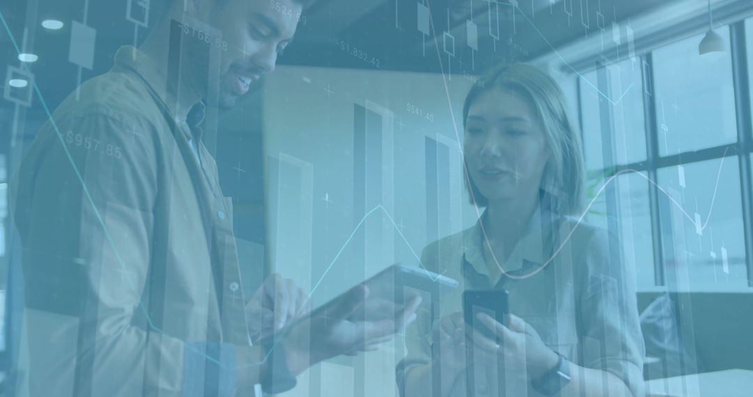 Diverse Colleagues Analyzing Digital Data Together for Business Success