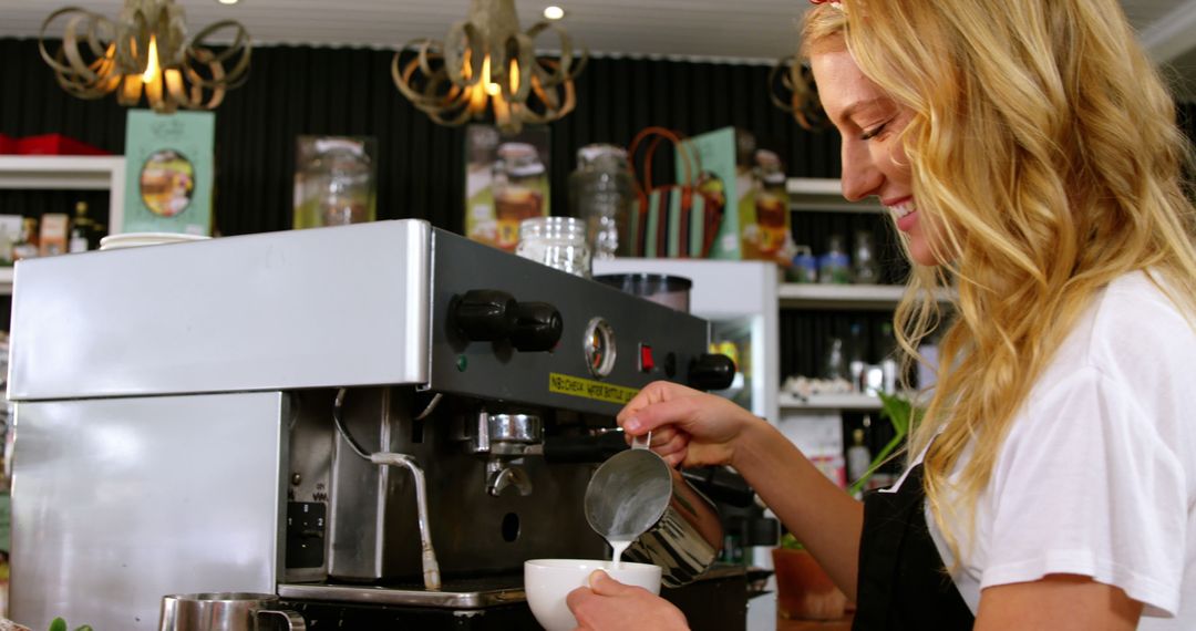 Smiling Barista Preparing Coffee Drink at Cafe - Free Images, Stock Photos and Pictures on Pikwizard.com