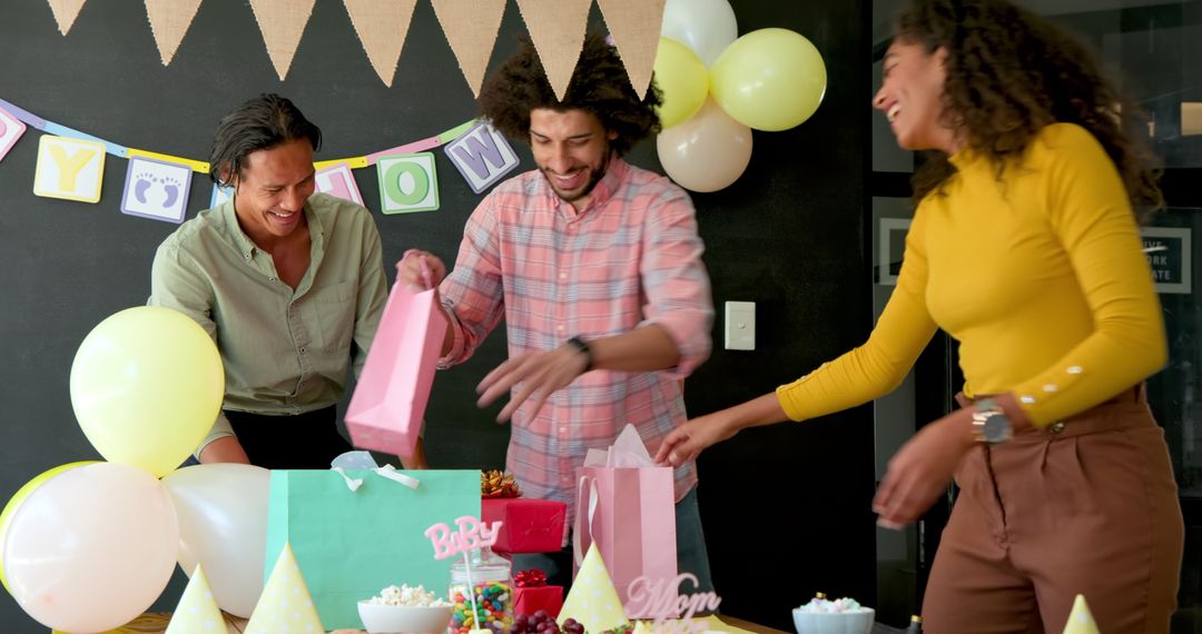 Colleagues Enjoying Baby Shower Party Preparation at Workplace