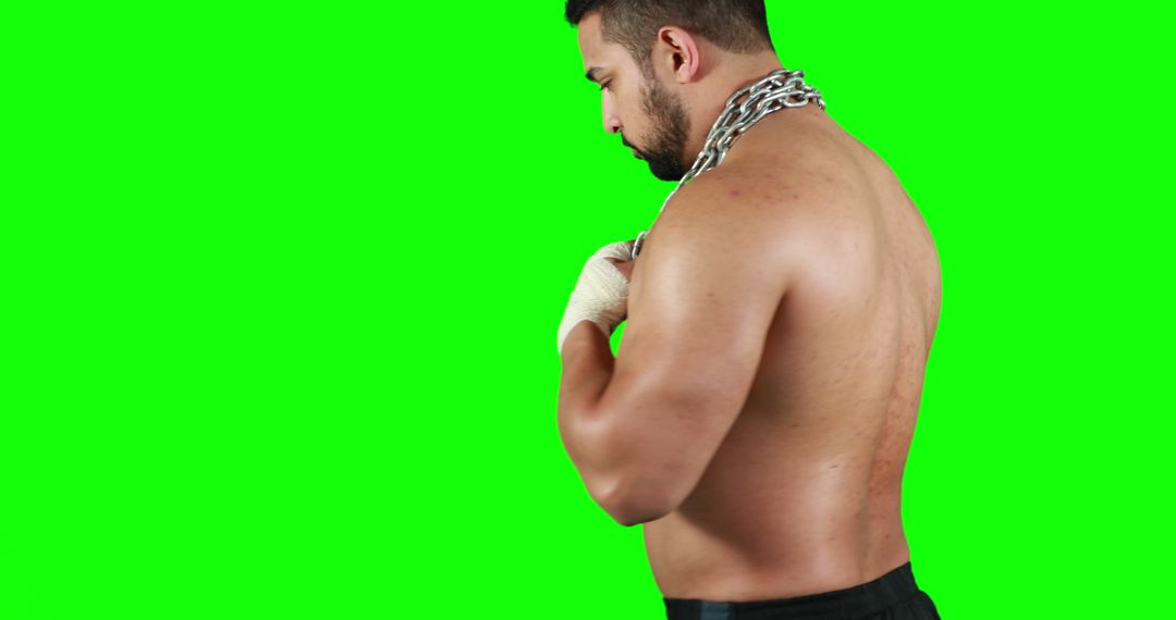 Muscular Man with Chain on Shoulders in Green Screen Studio - Free Images, Stock Photos and Pictures on Pikwizard.com