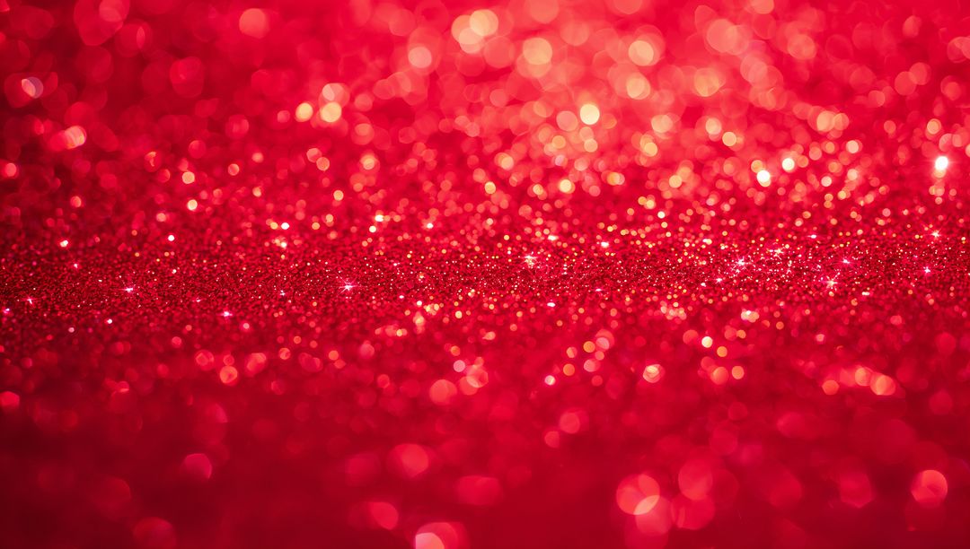 Shimmering crimson glitter bokeh background sparkling with shallow focus and festive sparkle