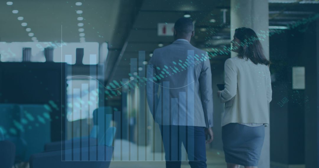 Coworkers Walking in Corridor with Data Overlay Illustrating Business Concepts