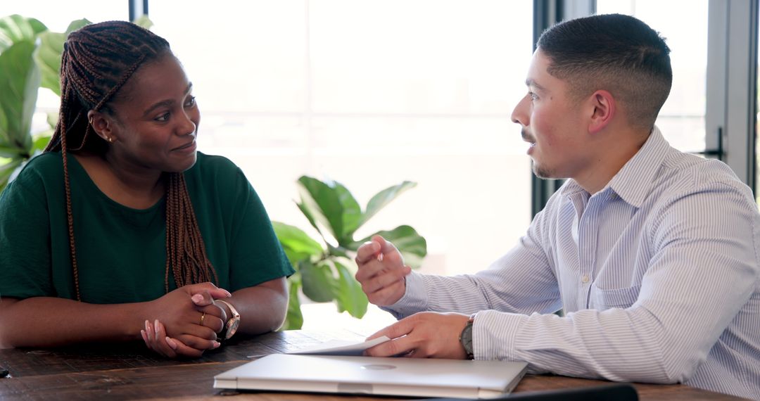 Colleagues Collaborating on Office Project Discussion