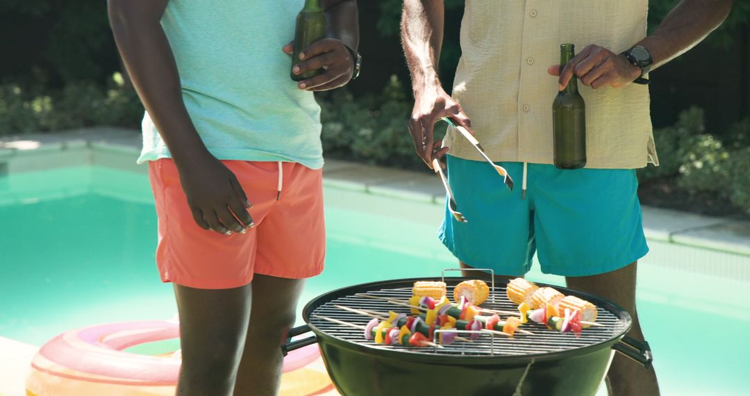 Outdoor Barbecue with Friends by Poolside During Summer