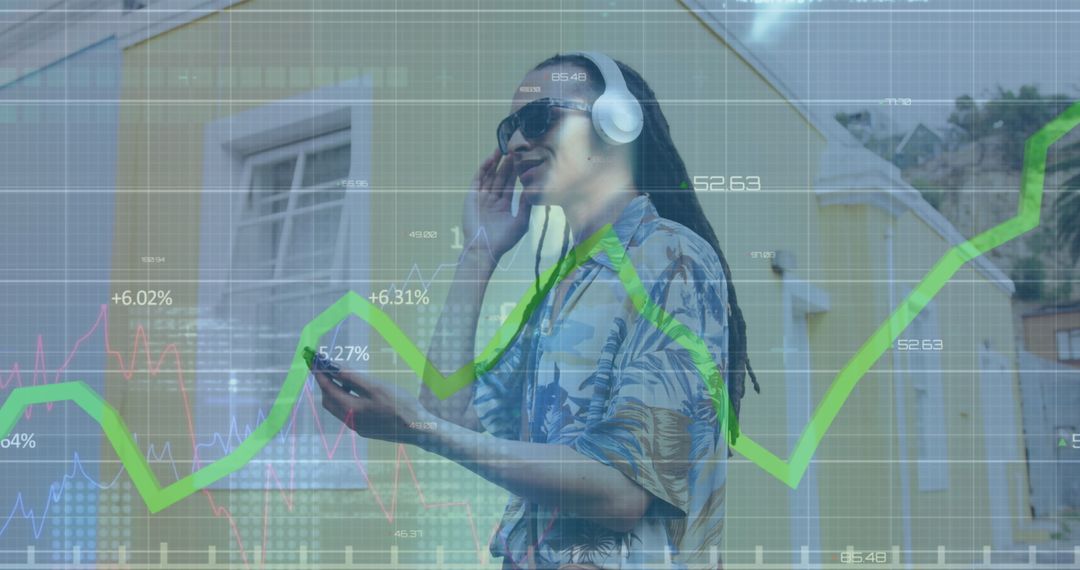 Young Man in Urban Area Uses Smartphone with Financial Data Overlay