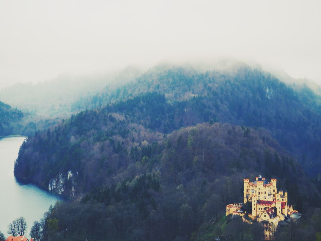 Medieval Castle in Misty Mountain Scenery - Free Images, Stock Photos and Pictures on Pikwizard.com