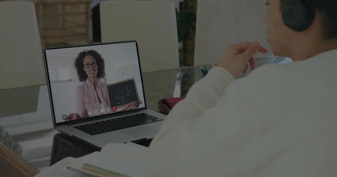 Teen Engaged in Online Geometry Class with E-Tutor