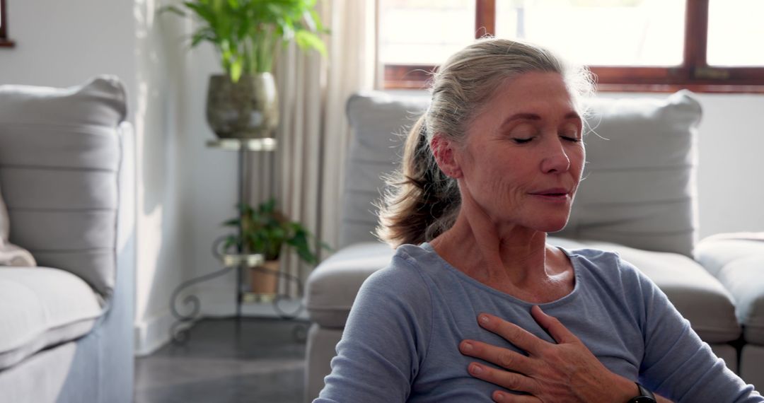 Senior Woman Practicing Mindfulness Breathing with Tranquil Expression