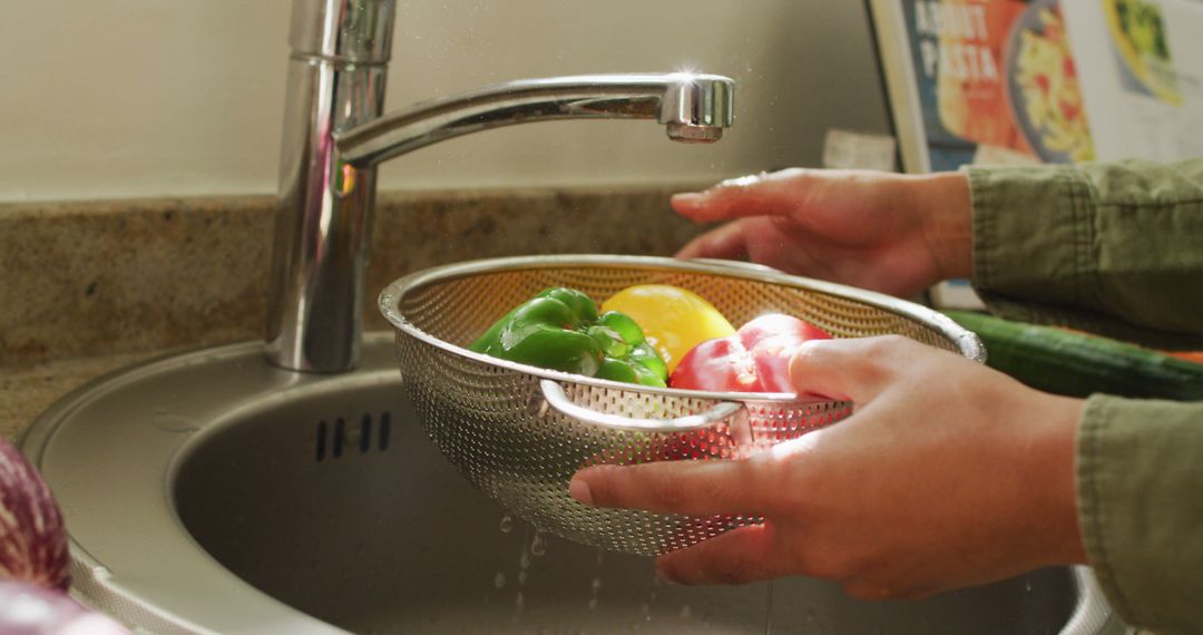 Hands Rinsing Fresh Vegetables Under Kitchen Faucet - Free Images, Stock Photos and Pictures on Pikwizard.com