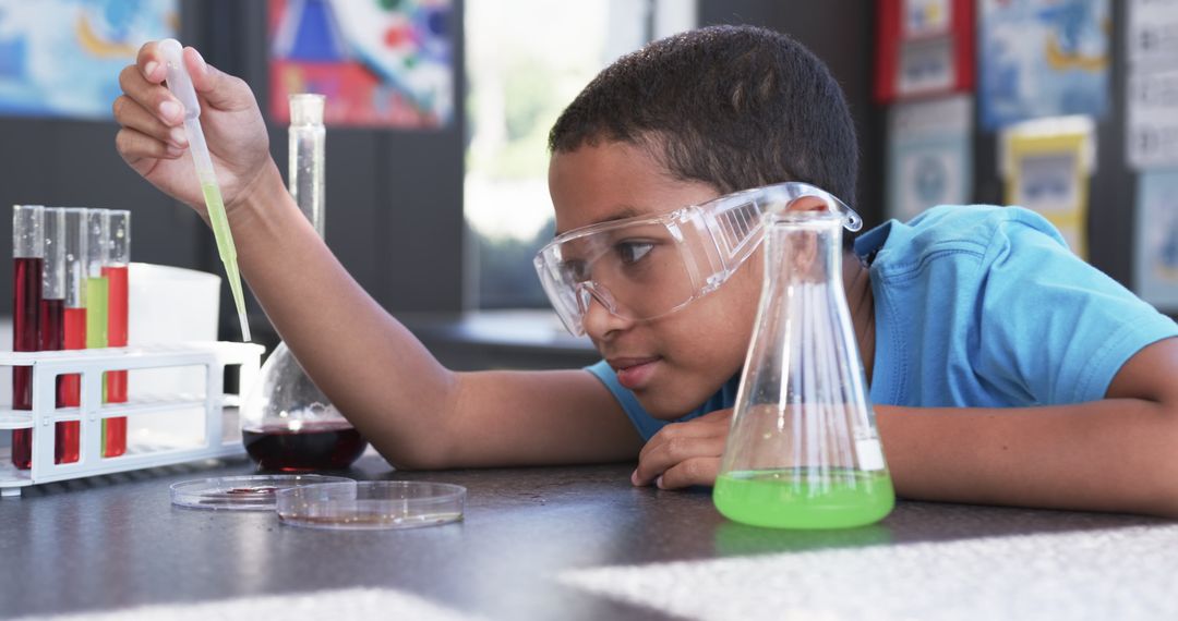 Curious Young Boy Conducting Experiment in School Laboratory