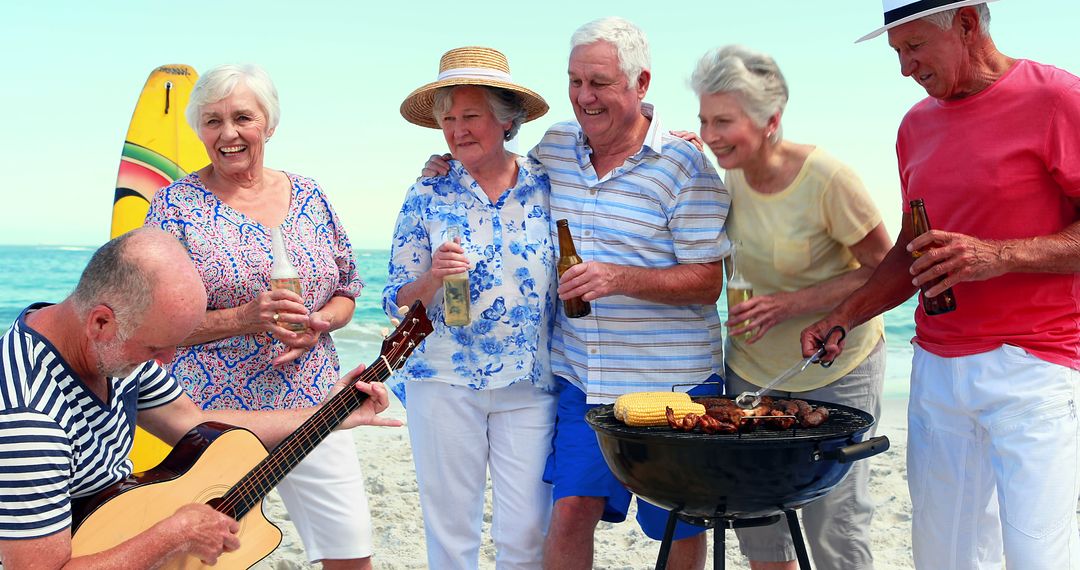 Seniors Enjoying Beach Barbecue with Live Music - Free Images, Stock Photos and Pictures on Pikwizard.com