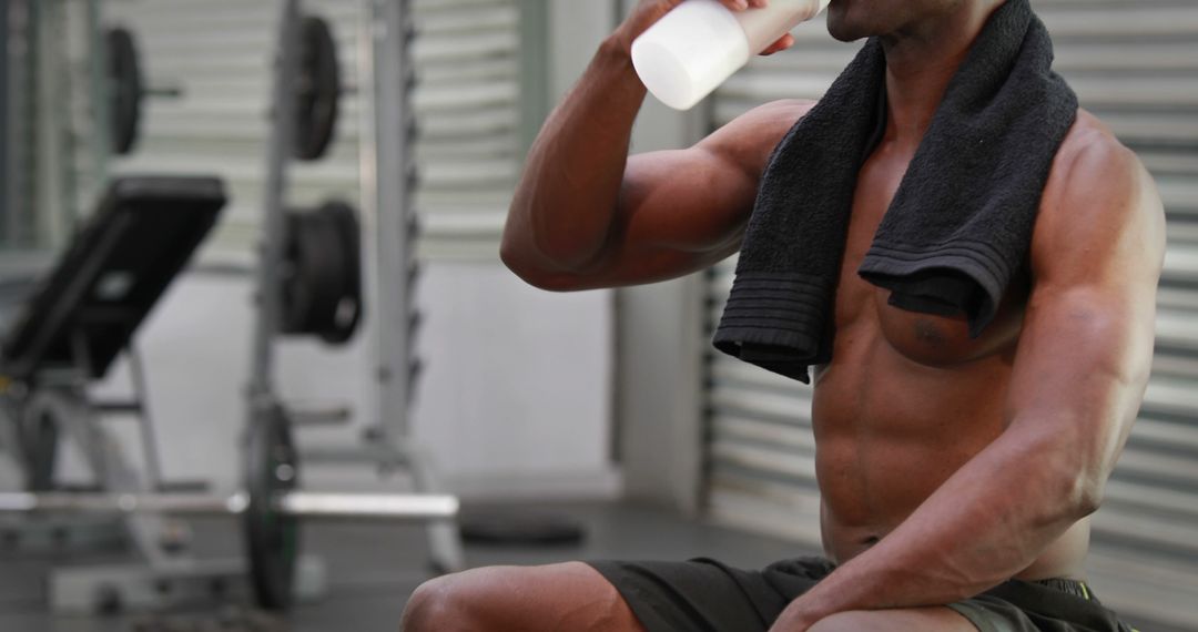 Fit Man Drinking Protein Shake in Gym - Free Images, Stock Photos and Pictures on Pikwizard.com