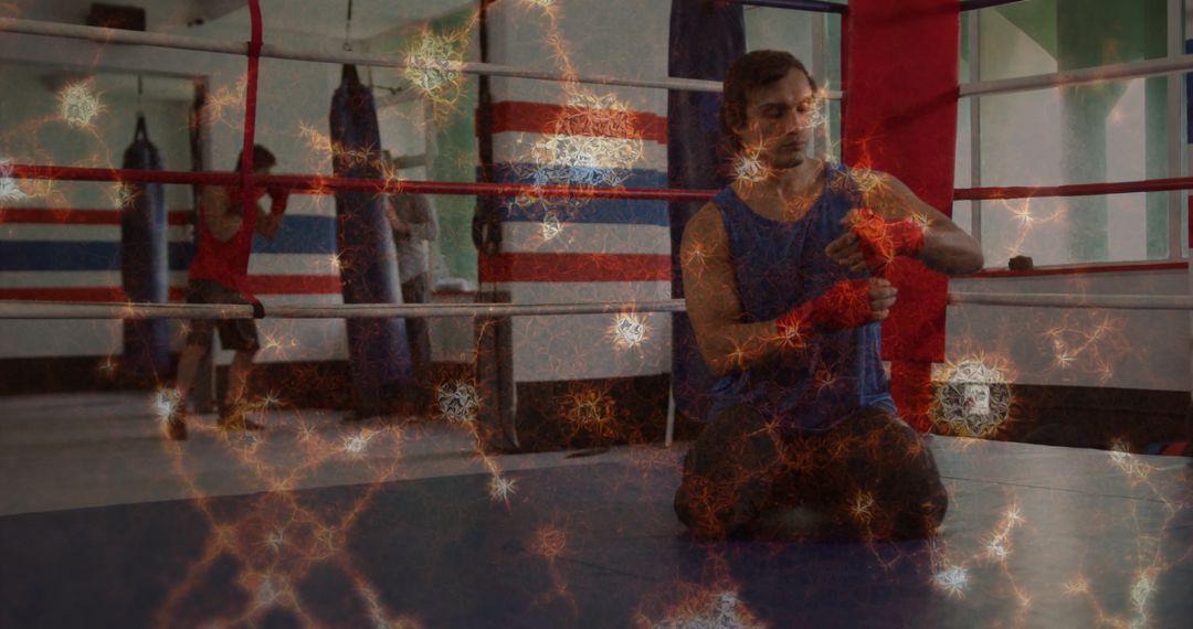 Focused Boxer Preparing Hand Wraps in Gym Setting