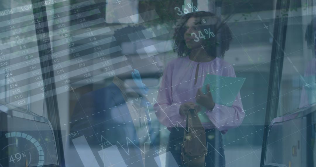 Businesswoman Analyzing Financial Data with Multifaceted Graphs