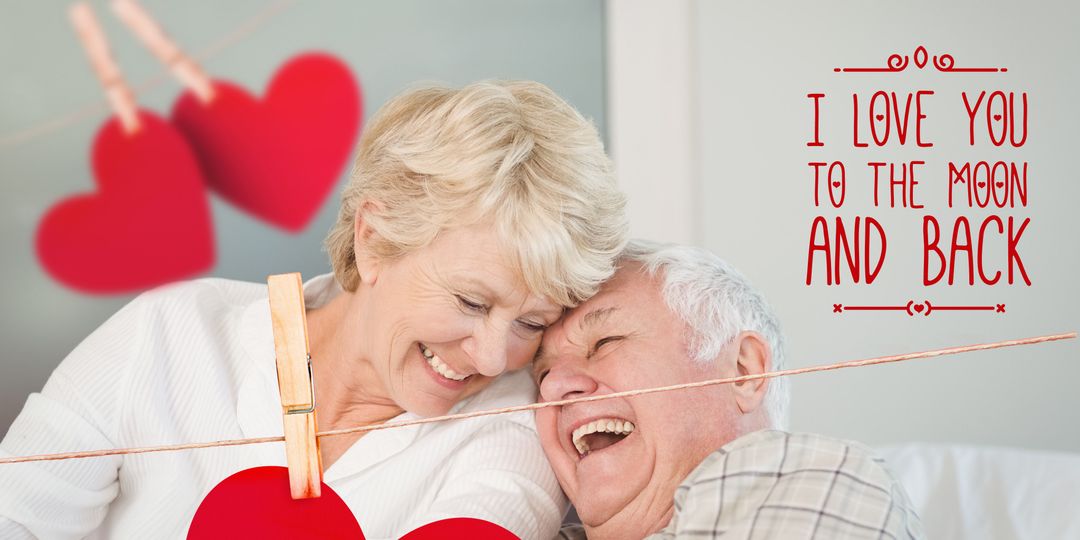 Elderly Couple Embracing Love with Heart Decoration