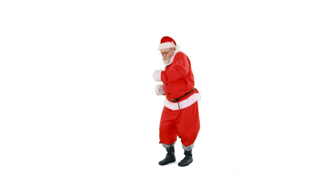 Santa Claus dancing in festive suit on white background - Free Images, Stock Photos and Pictures on Pikwizard.com