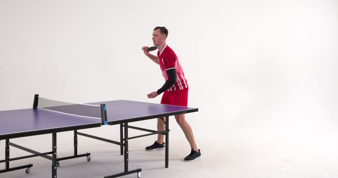 Focused Table Tennis Player Ready for Shot