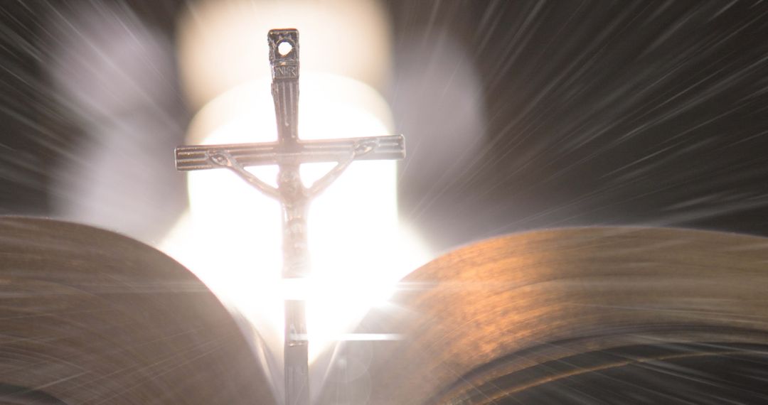 Glowing Cross and Open Holy Book