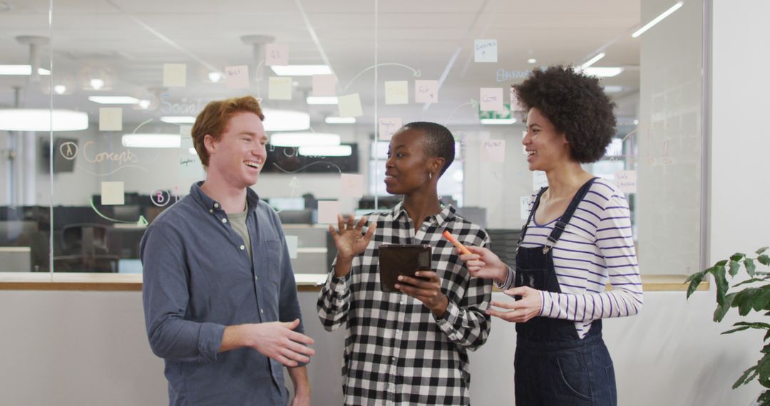 Team Collaboration in Modern Office with Diverse Colleagues