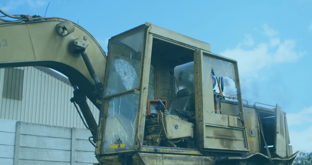 Operator Working on Large Excavator at Construction Site