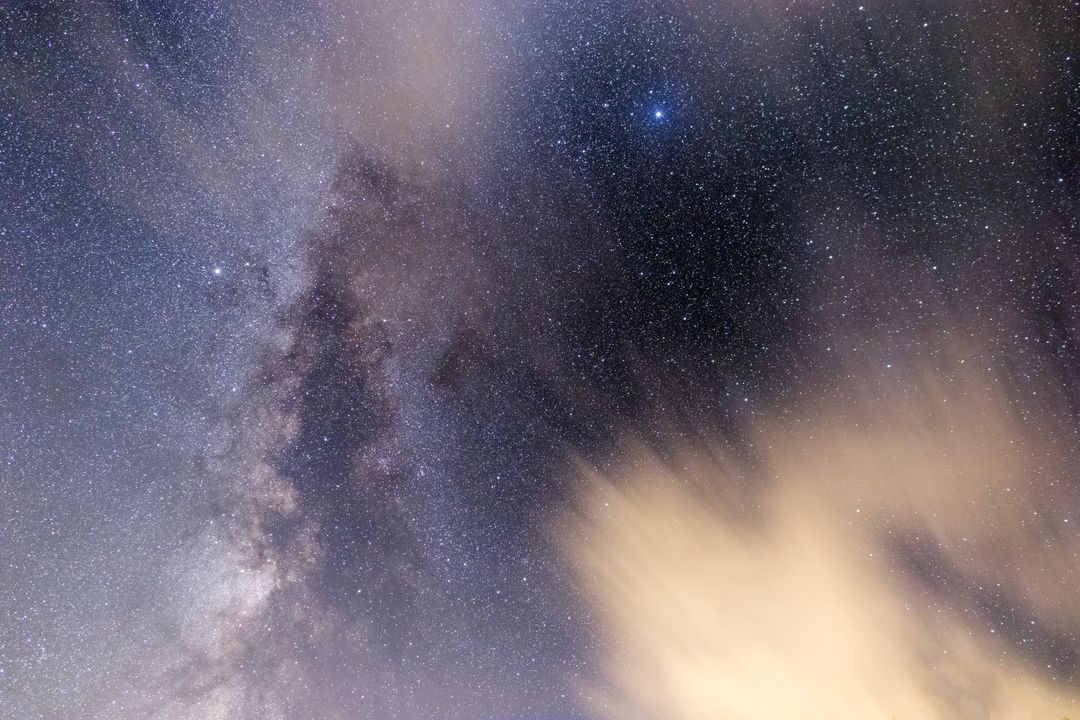Milky Way with Clouds and Starry Sky