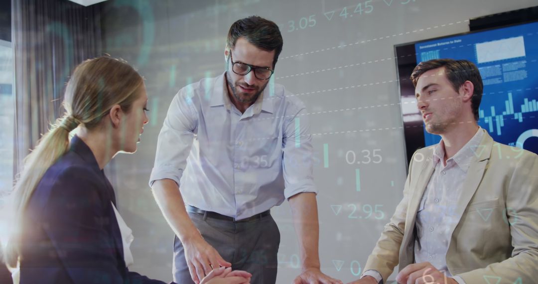 Coworkers Analyzing Stock Market Reports in Office Environment