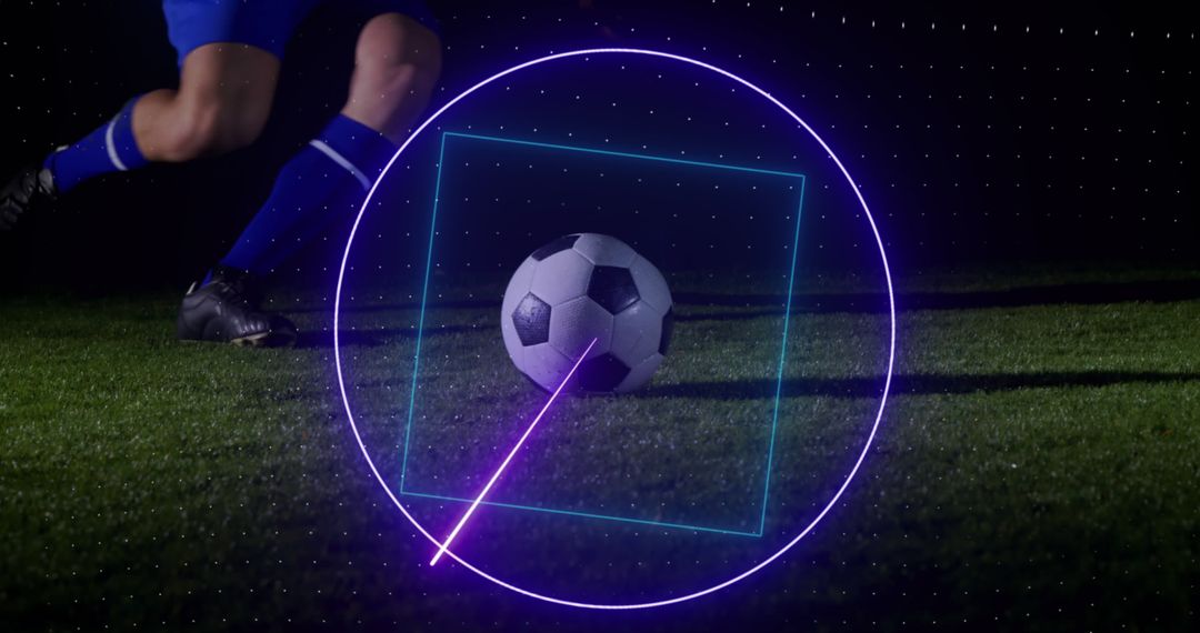 Soccer Player Kicking Ball with Futuristic Neon Guidelines on Field - Free Images, Stock Photos and Pictures on Pikwizard.com