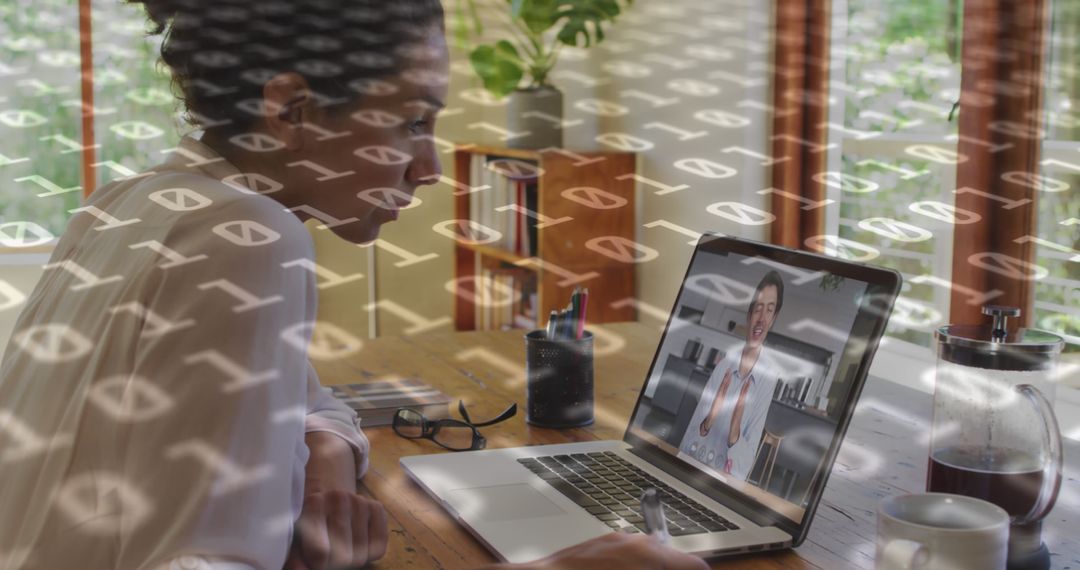 Binary Codes Overlaying Businesswoman in Video Call on Laptop