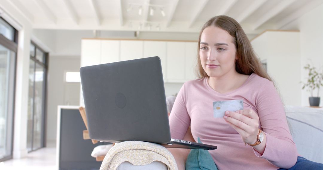 Woman Using Laptop for Online Shopping at Home - Free Images, Stock Photos and Pictures on Pikwizard.com