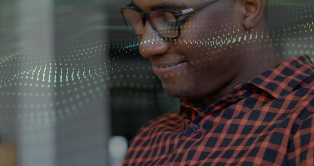 Man Analyzing Digital Data in Tech Workspace
