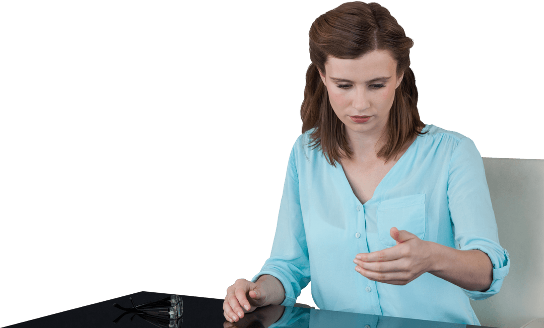Businesswoman Interacting with Virtual Projection on Transparent Surface