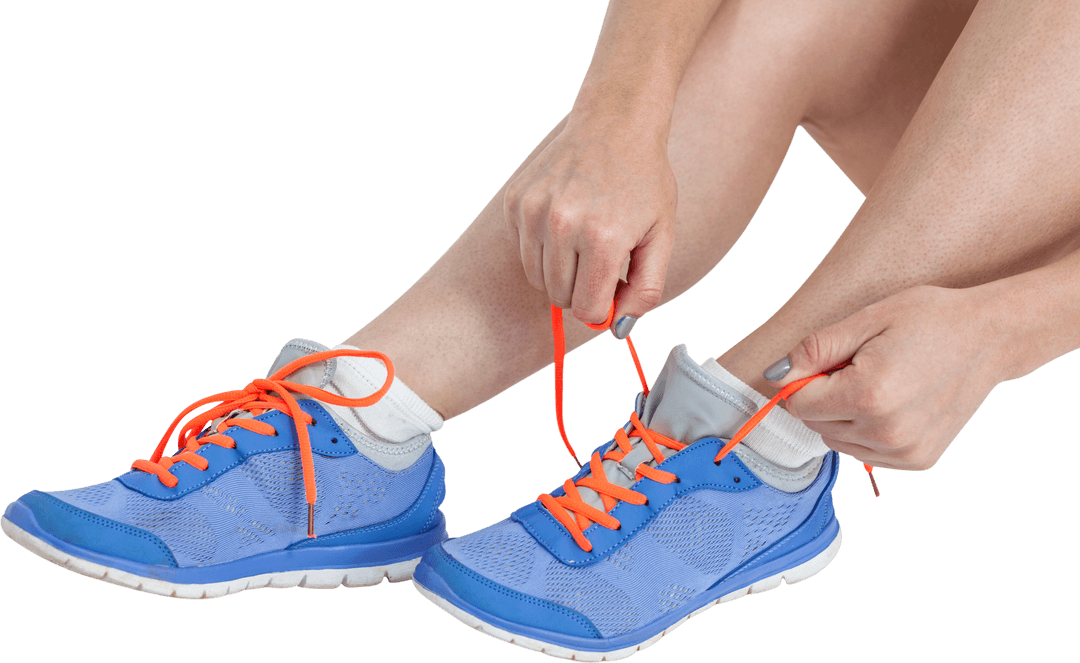 Woman Tying Running Shoes with Neon Orange Laces on Transparent Background