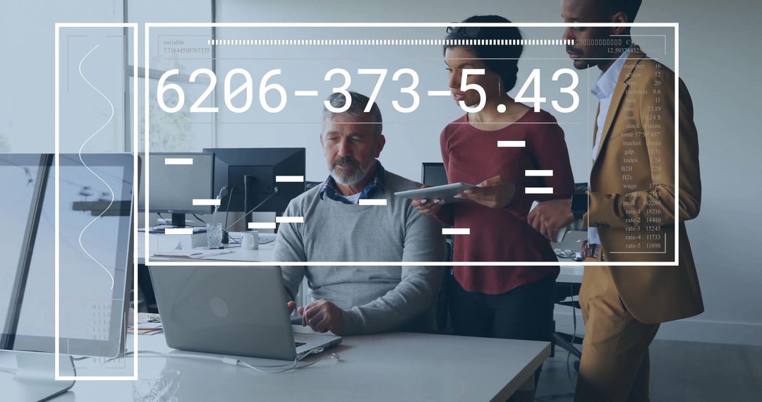 Collaborative team reviewing data on laptop with futuristic HUD overlay in modern office