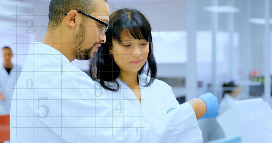 Diverse Scientists Collaborating on Data in Modern Laboratory