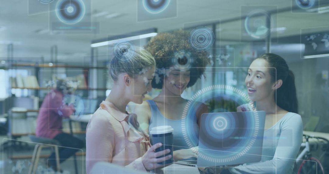 Coworkers Collaborating at Modern Tech Office on Laptop