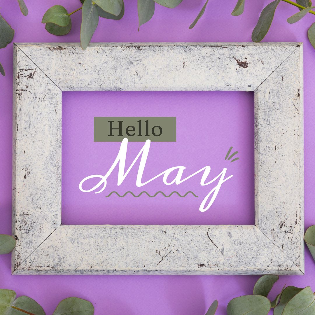 Hello May Text on Colorful Background with Green Leaves