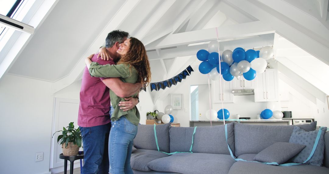 Couple Celebrating Birthday with Decorations and Balloons at Home