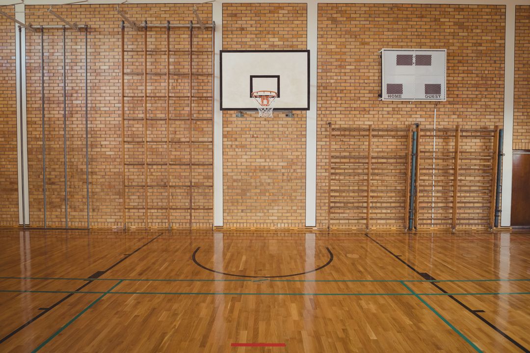 Empty High School Basketball Court with Wooden Floor - Free Images, Stock Photos and Pictures on Pikwizard.com
