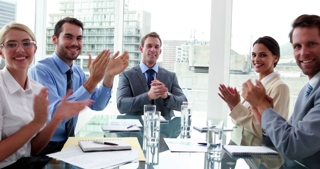 Business Meeting Team Applauding Success in Modern Office - Free Images, Stock Photos and Pictures on Pikwizard.com