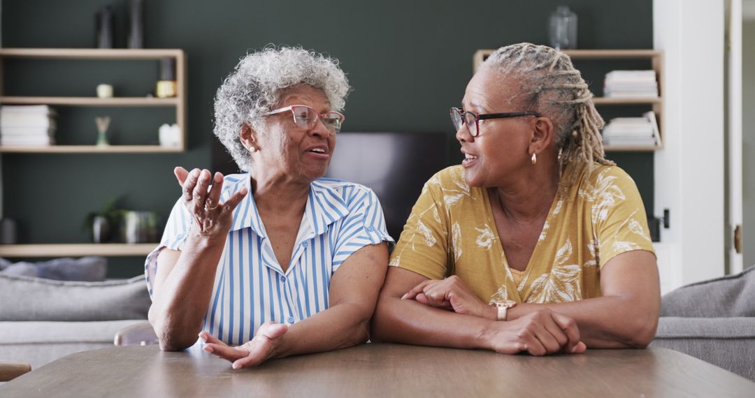 Senior Friends Chatting Happily at Home